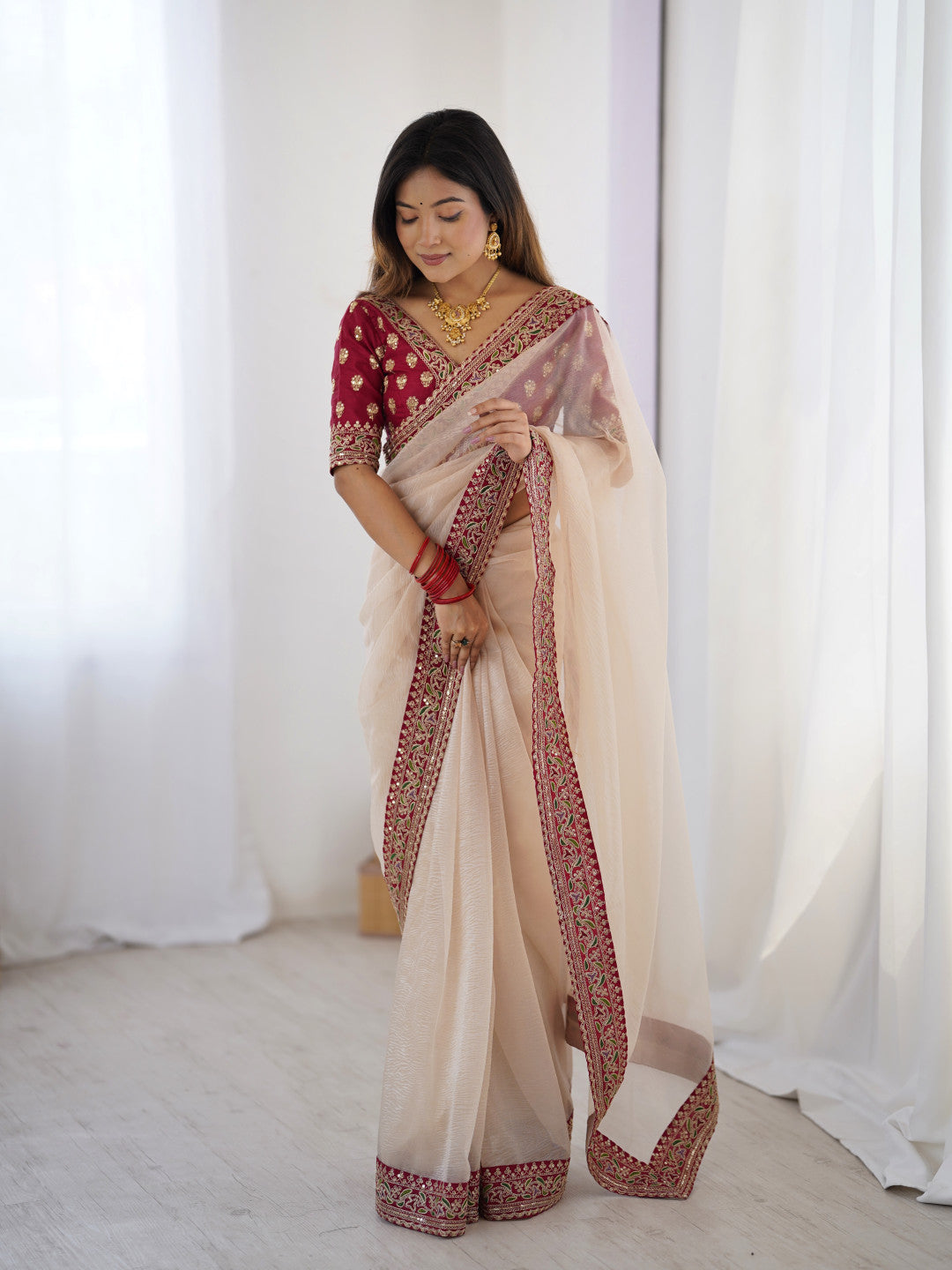 Net Saree With Sequence Zari Work Border